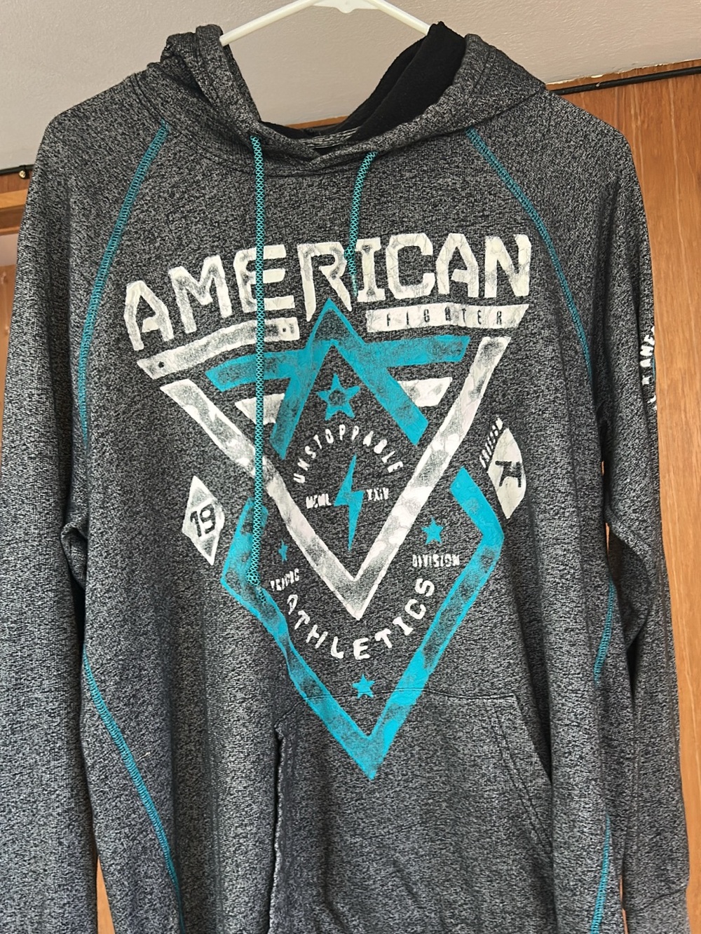 American Fighter Gray Hooded Pullover with Teal Graphic